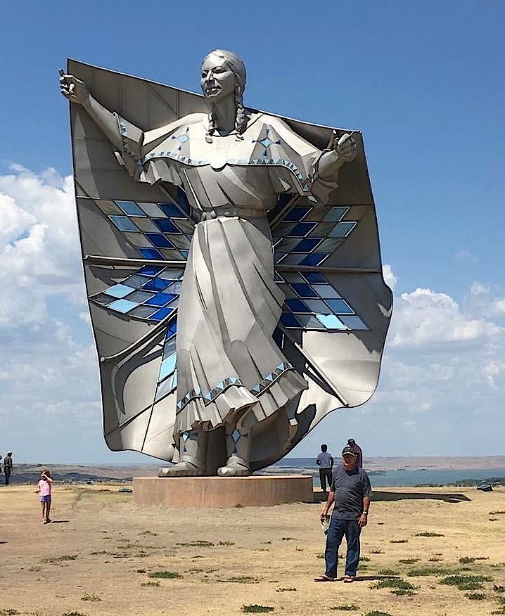 DIGNITY - by Dale Lamphere, in honor of the women of the Great Sioux Nation. Dignity sits on a bluff just east of Chambelain, South Dakota. Missouri River in the backgroung, to the west.